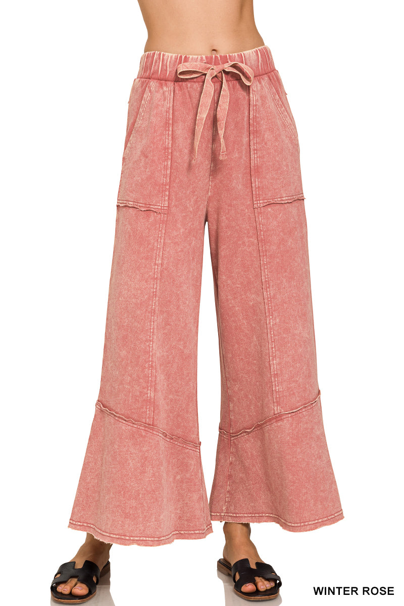 Exposed-seam flare hem pants with pockets