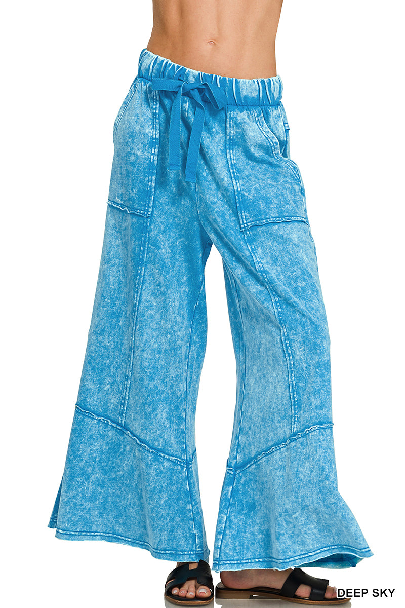 Exposed-seam flare hem pants with pockets