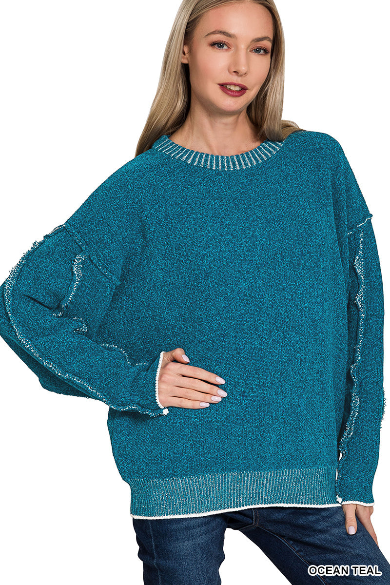 Exposed seam sweater