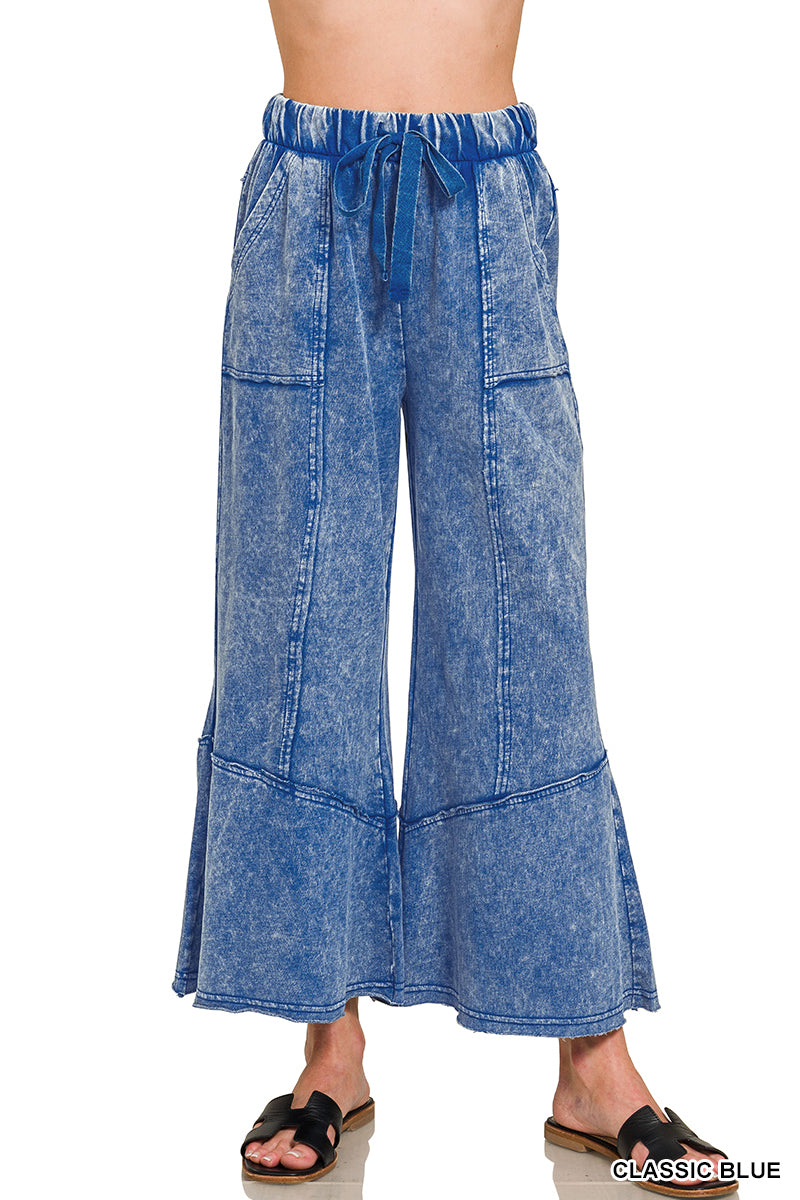 Exposed-seam flare hem pants with pockets