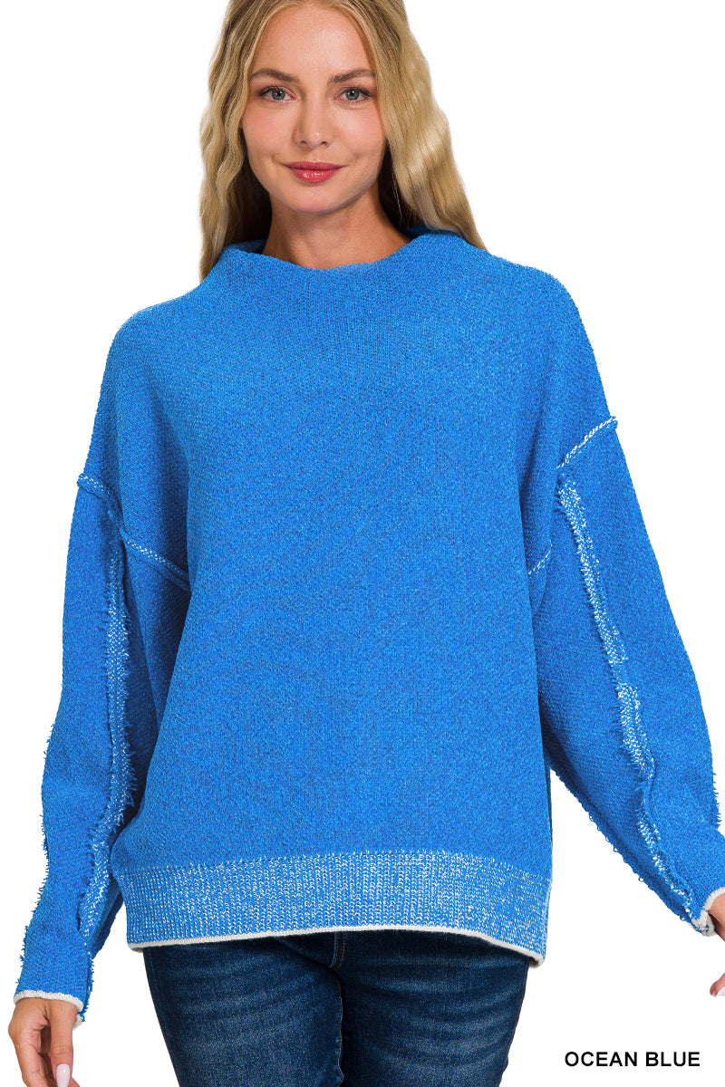 Oversized mock neck raw seam chenille sweater