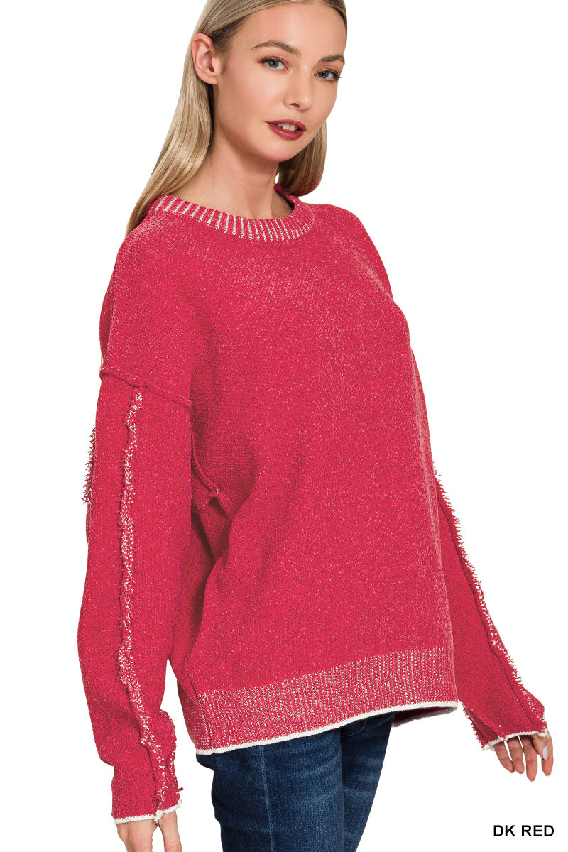 Exposed seam sweater